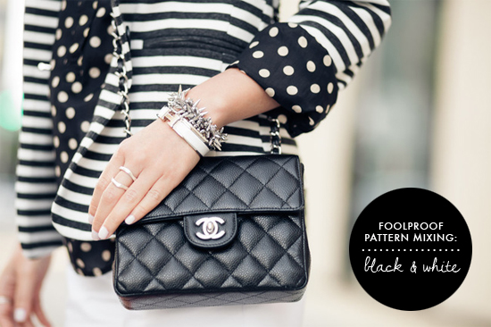 Easiest way to mix patterns: black and white. Always chic black and white pattern mixing