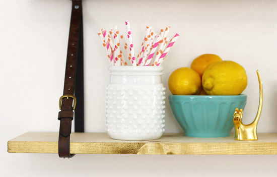 Belt strap holding up a shelf