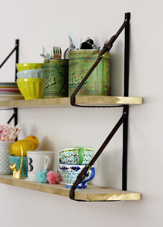 DIY wooden shelf with belt straps