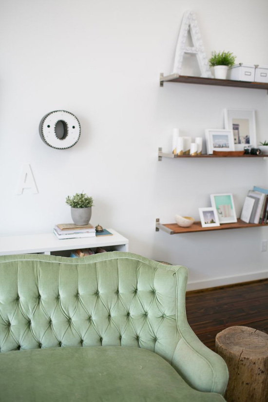 Tufted green sofa