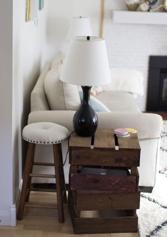 DIY side table made of boards that were stained and screwed together into crates