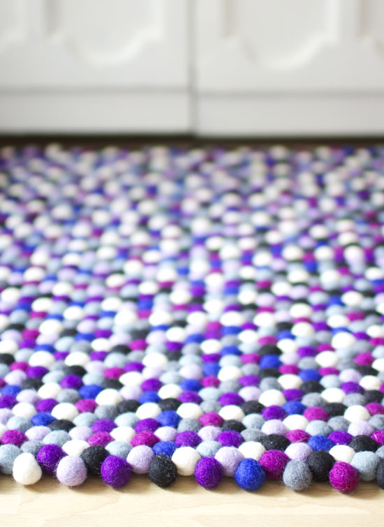 Purple felt ball rug