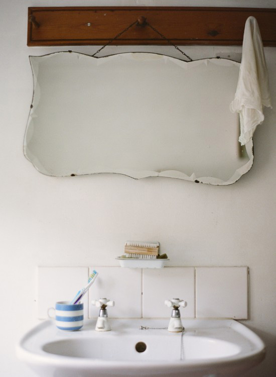 Hang a vintage mirror in the bathroom