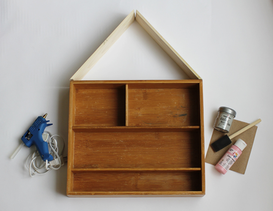 Turn a flatware organizer into a cute “house” to hang on the wall and store craft supplies