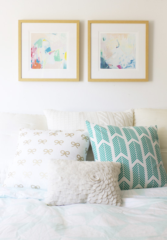 Colorful art prints in the bedroom