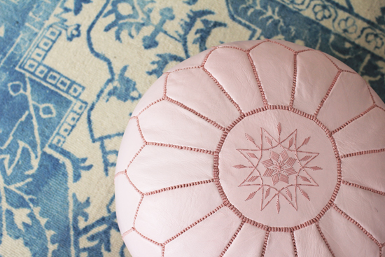 Pink pouf and wool rug from Dynamic Rugs