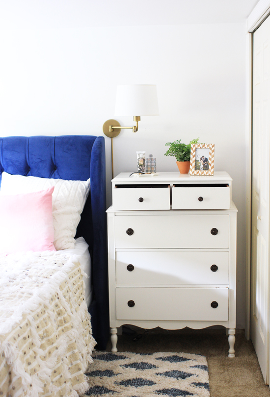 Use dresser as a nightstand to save space in a small bedroom