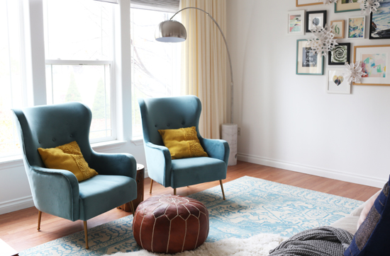 Blue velvet armchairs and modern floor lamp
