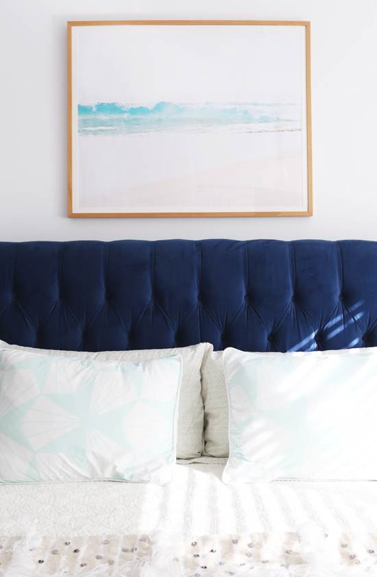 Beach print above the bed